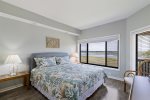 Master bedroom with king bed and views galore